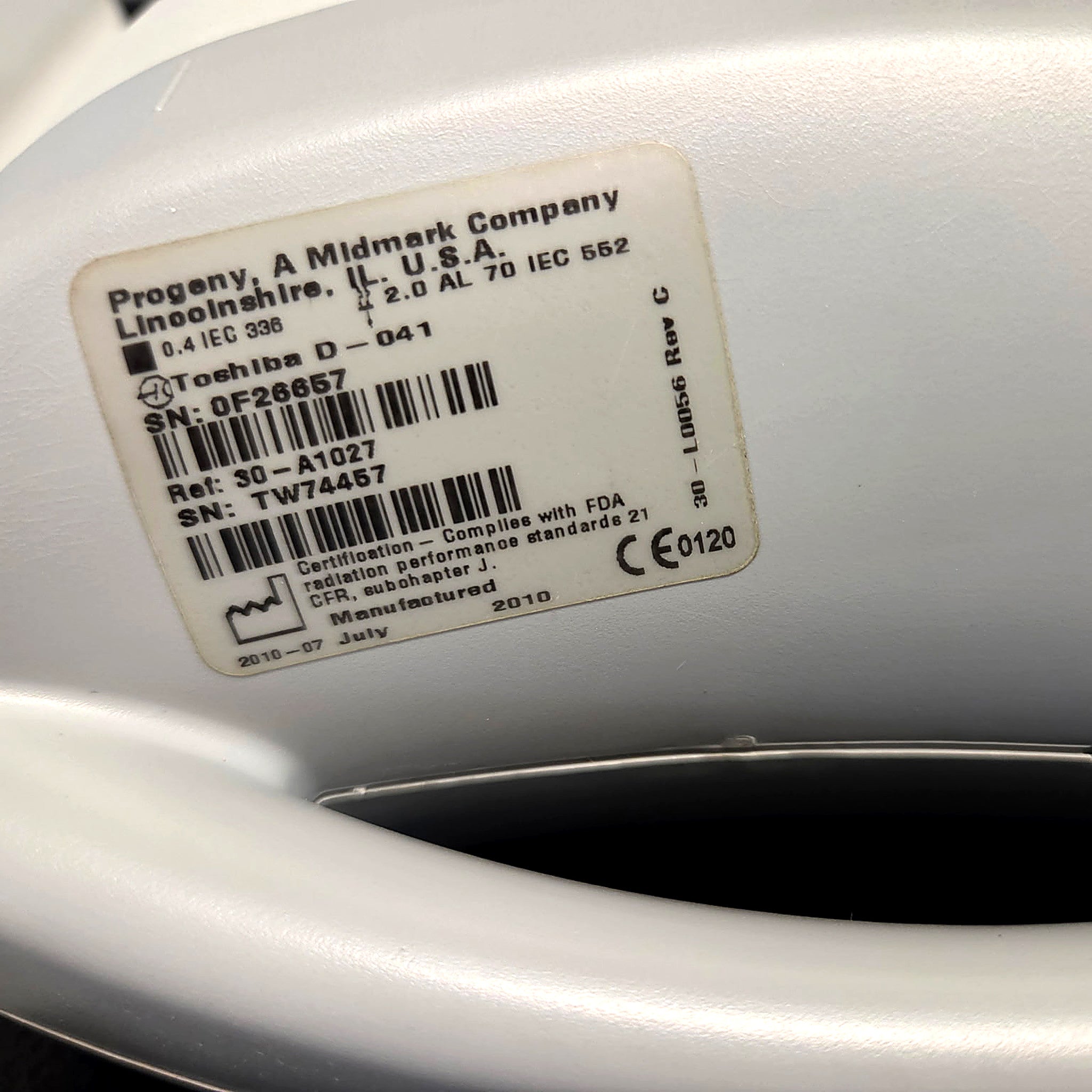 Progeny Preva tube head label: REF 30-A1027, Toshiba D-041 tube, 0.4 mm focal spot, 2.0 mm Al filtration, manufactured July 2010, FDA 21 CFR Subchapter J, CE 0120