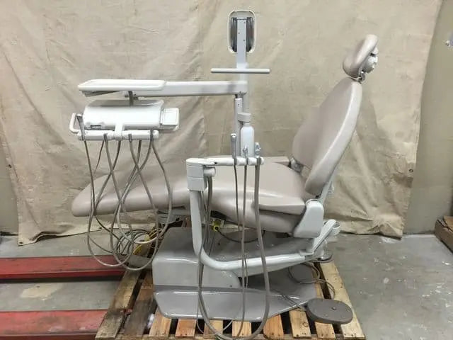 Refurbished A-dec 1040 Cascade dental chair with radius delivery unit, monitor mount post and assistant's arm