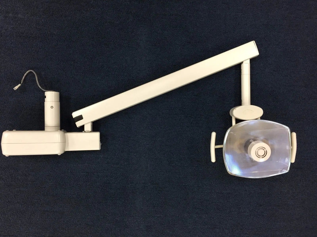 Knight Model L operatory light assembly: track trolley mount, articulating arm and light head