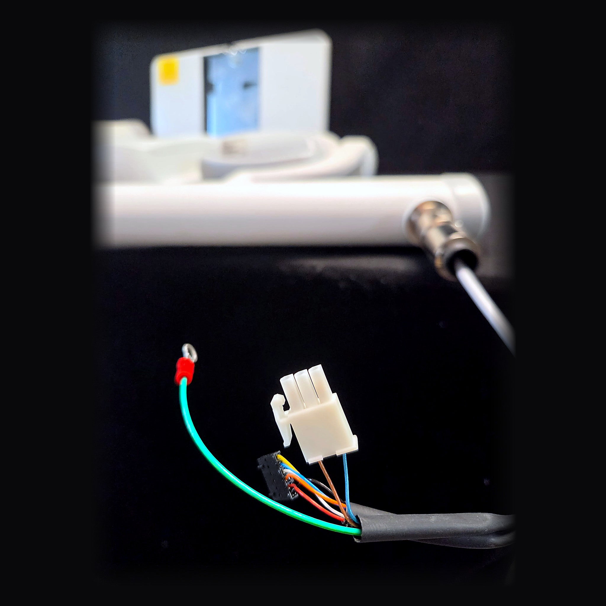 New main cable assembly for Midmark Progeny Preva intraoral X-ray showing multi-pin connector, keyed power plug and green ground lead with ring terminal