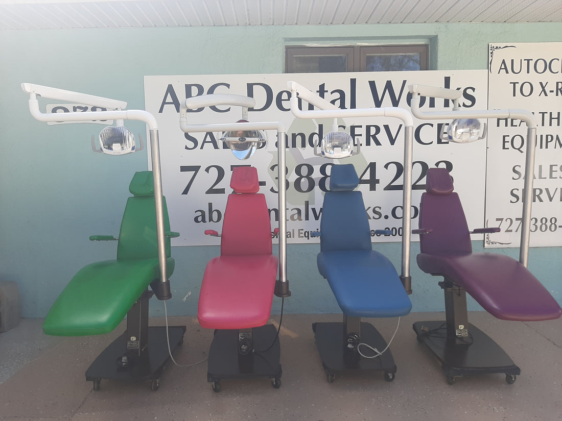 Pelton & Crane Royal Model II orthodontic package: all four chairs shown together outdoors in green, red, blue and purple with overhead LED lights.