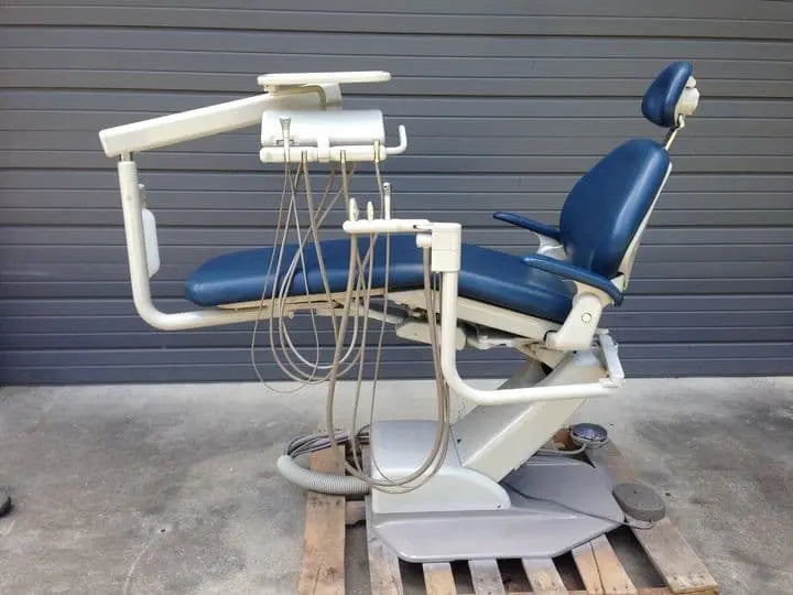 Refurbished A-dec 1021 Cascade dental chair in blue upholstery with radius delivery unit and assistant's arm