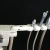 A-dec 1021 Cascade Radius Chair with Euro-style Delivery, Assist. Pkg., Dual Touch Pads, 6300 Light, and Matching Stools.