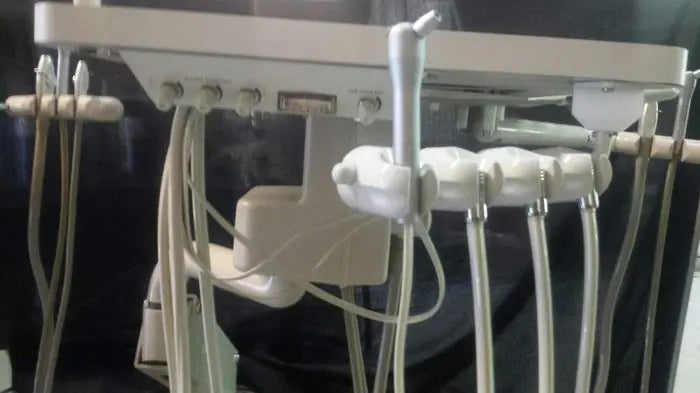 A-dec Wall Mount Rear Delivery with Assistant Instrumentation.