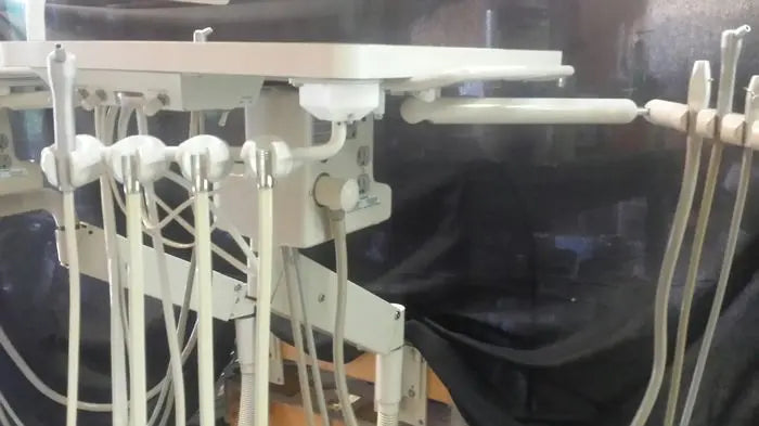 A-dec Wall Mount Rear Delivery with Assistant Instrumentation.