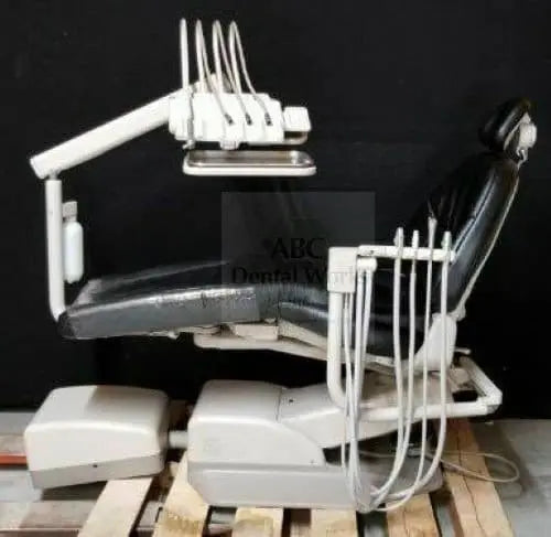 Refurbished A-dec 1040 Cascade dental chair in black upholstery with Euro-style over-the-patient delivery unit