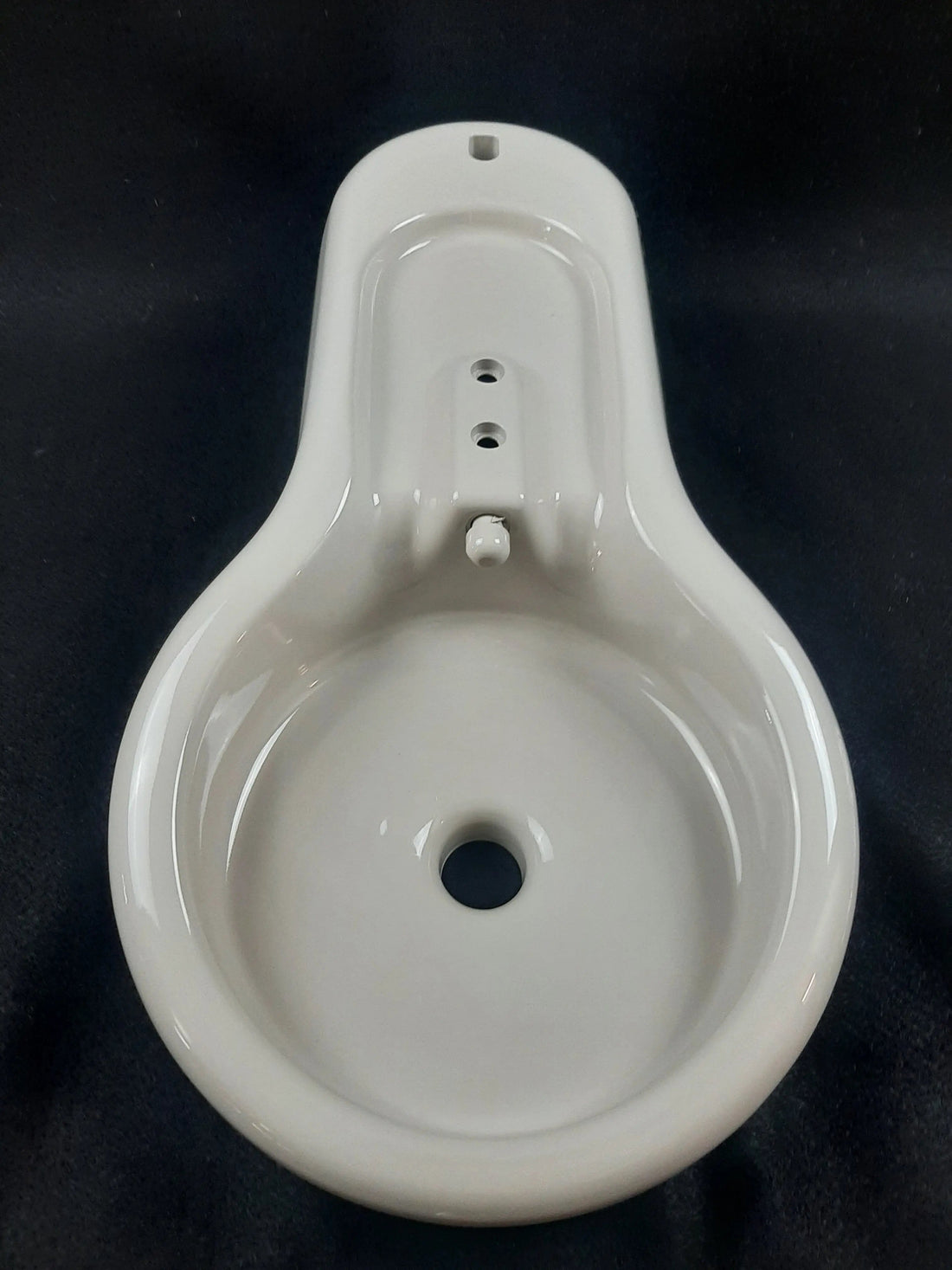 A-dec 75.0028.00 plastic cuspidor housing, front view