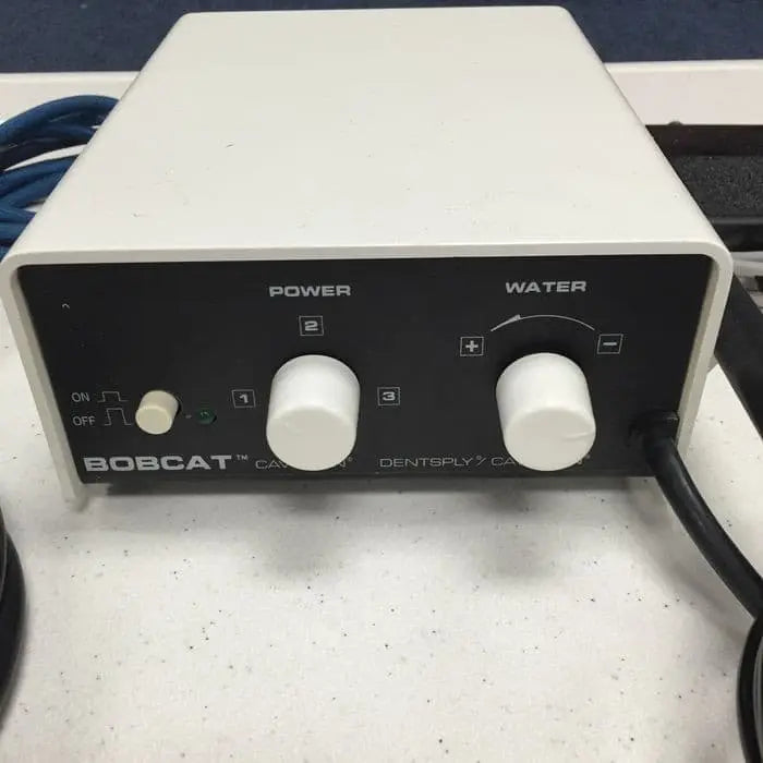 Dentsply Cavitron Bobcat GEN-115 ultrasonic scaler, front panel with power and water control dials