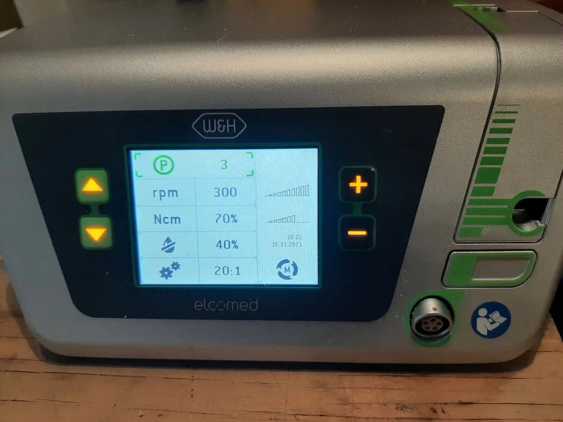 Refurbished W&H Elcomed SA-310 surgical control unit, angled view showing the LCD display and irrigation pump slider