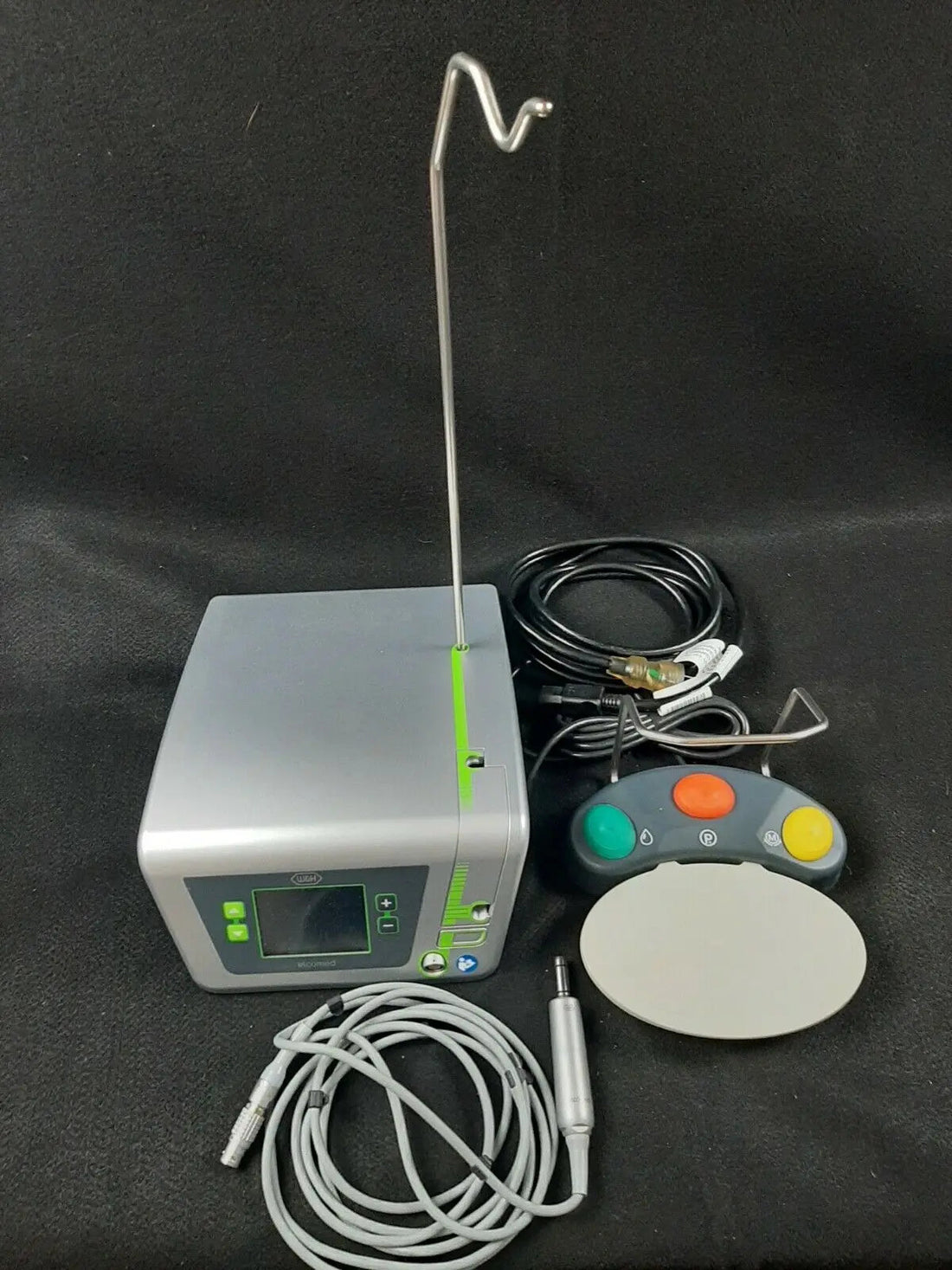 W&H Elcomed SA-310 surgical motor system – control unit, surgical motor, motor cable, foot control and irrigation stand as shown