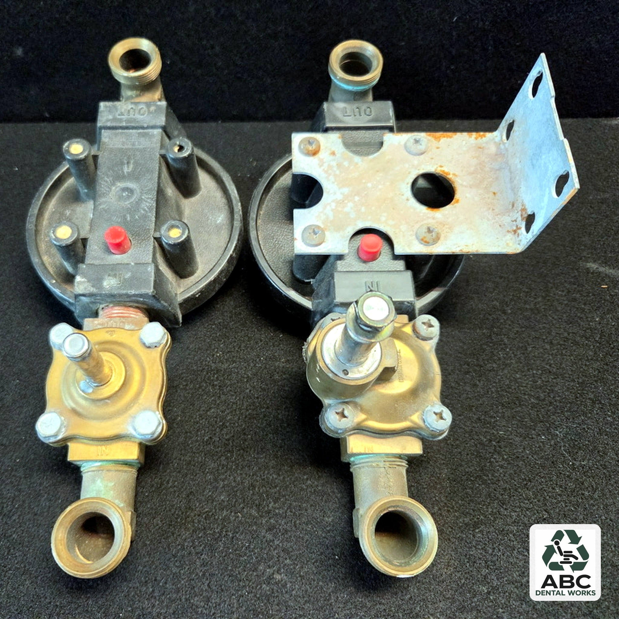 Air Techniques water filter housing and solenoid valve assemblies, used – top view showing IN/OUT ports and mounting bracket